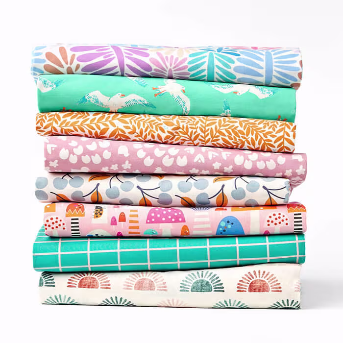 Cotton Poplin Brava fabric demonstrating its structured drape and crisp hand-feel