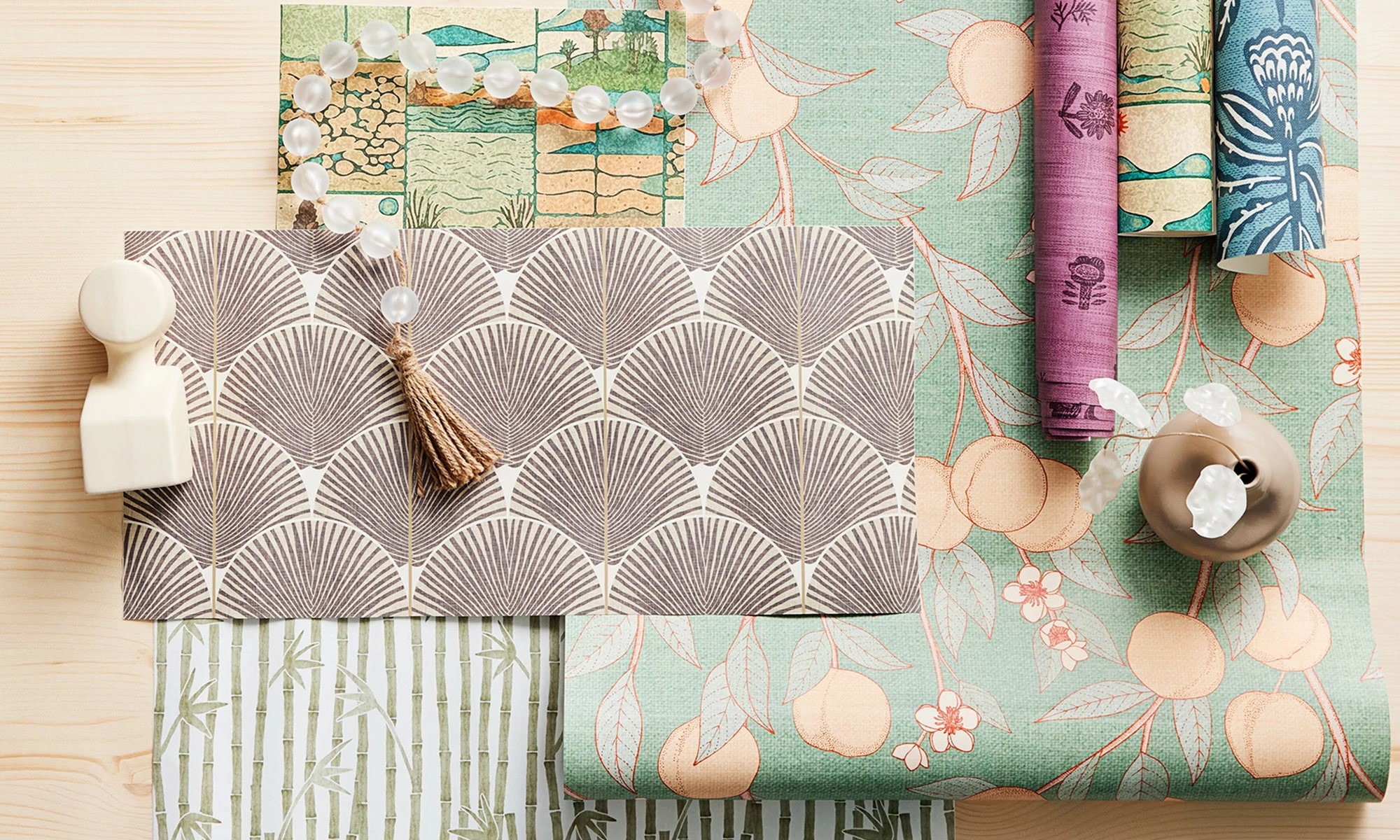 Japandi farmhouse style wallpaper rolls and swatches.