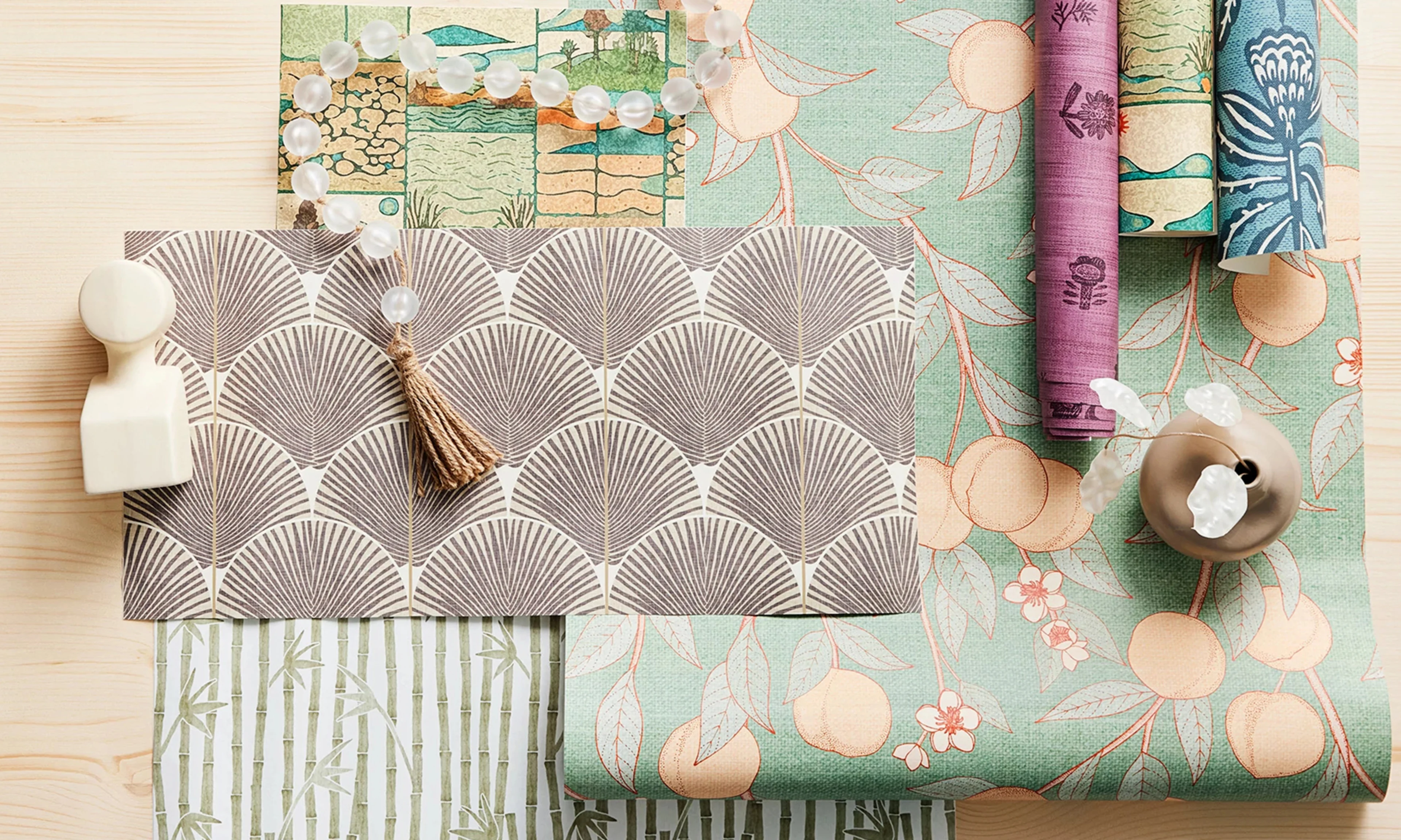 Japandi farmhouse style wallpaper rolls and swatches.