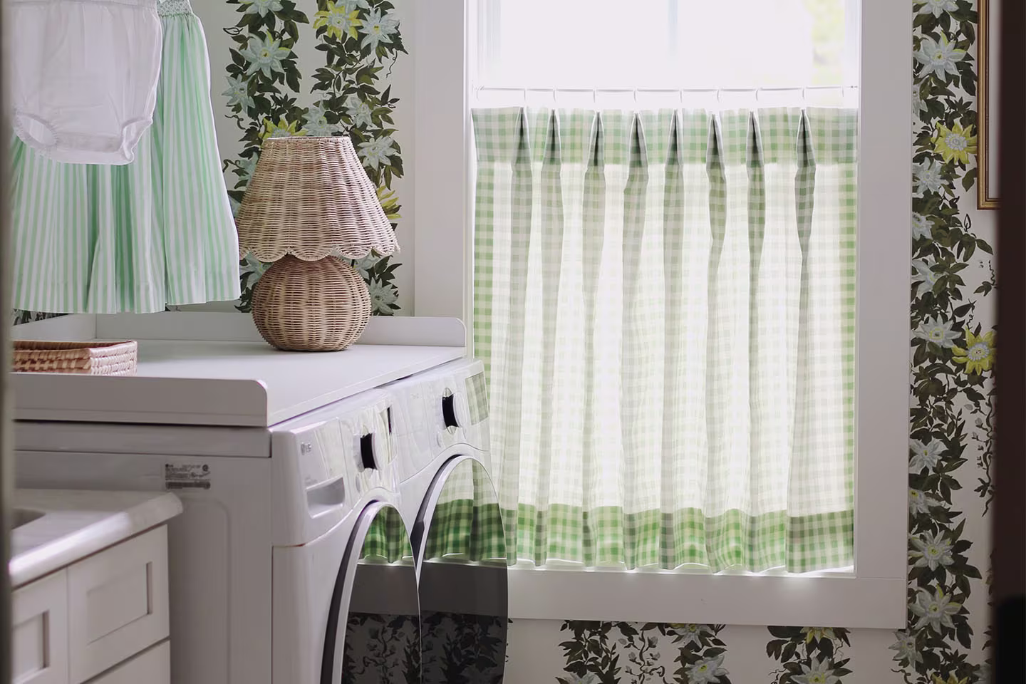 Laundry room using Spoonflower wallpaper and cafe curtain made from Spoonflower fabric.