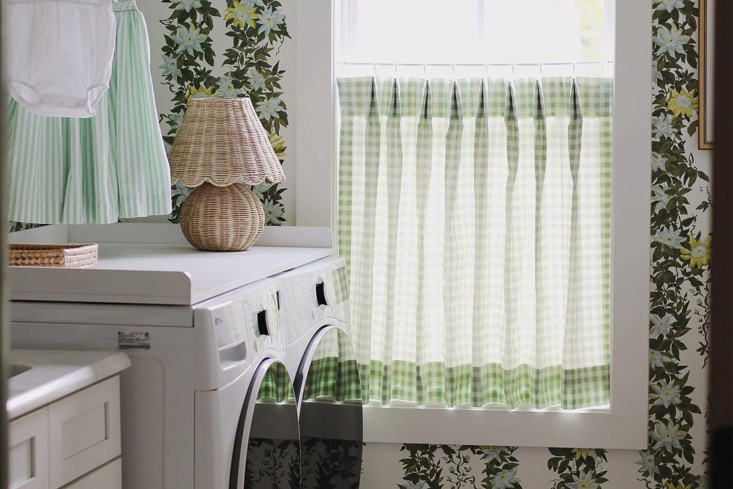 Laundry room using Spoonflower wallpaper and cafe curtain made from Spoonflower fabric.