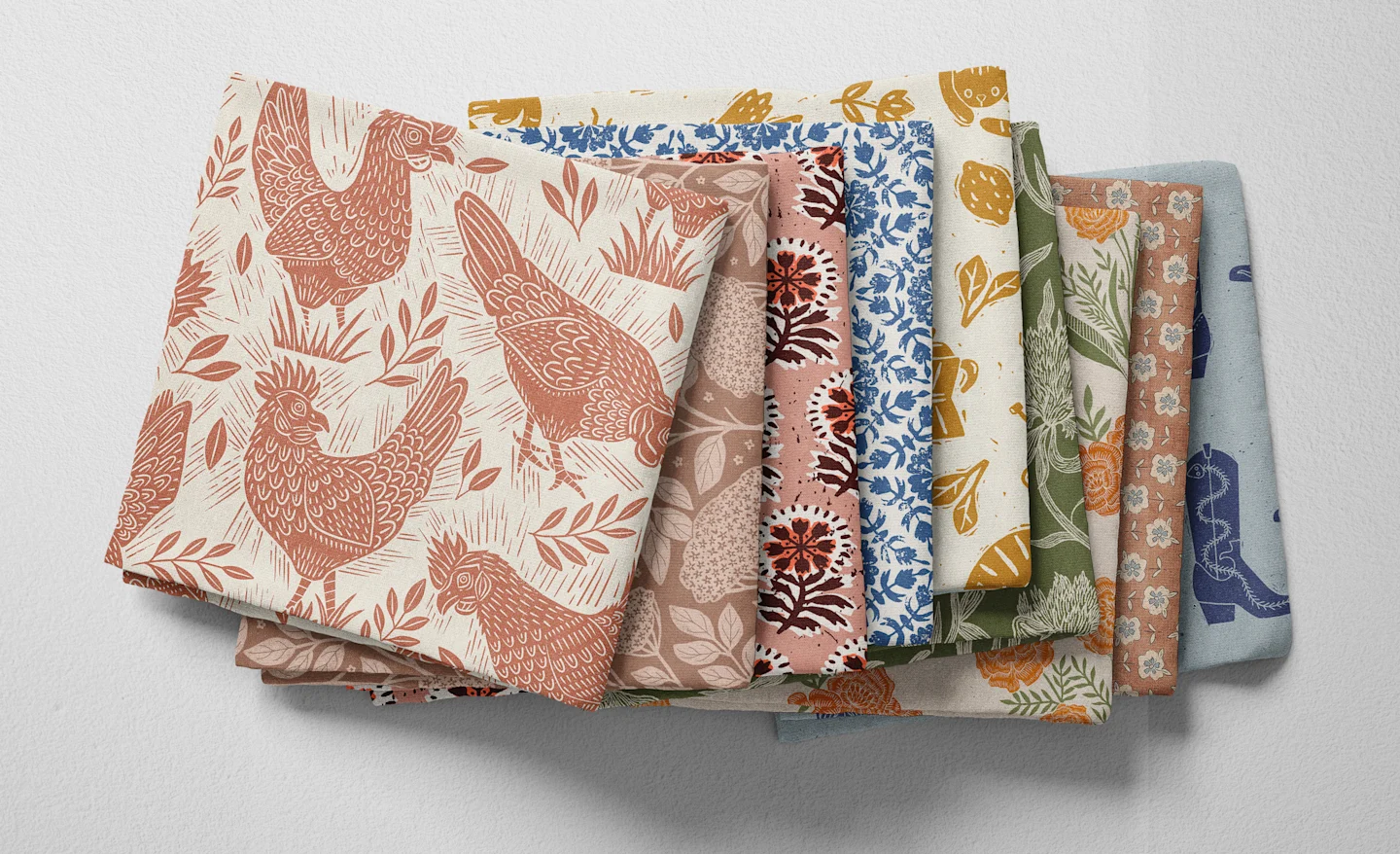 A selection of folded fabric by Spoonflower