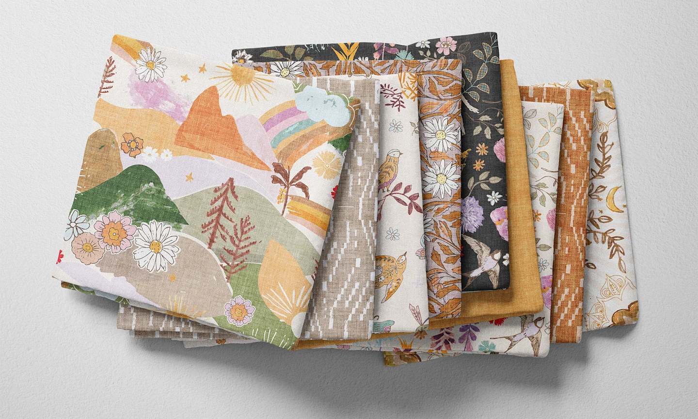 A selection of folded fabric by Spoonflower