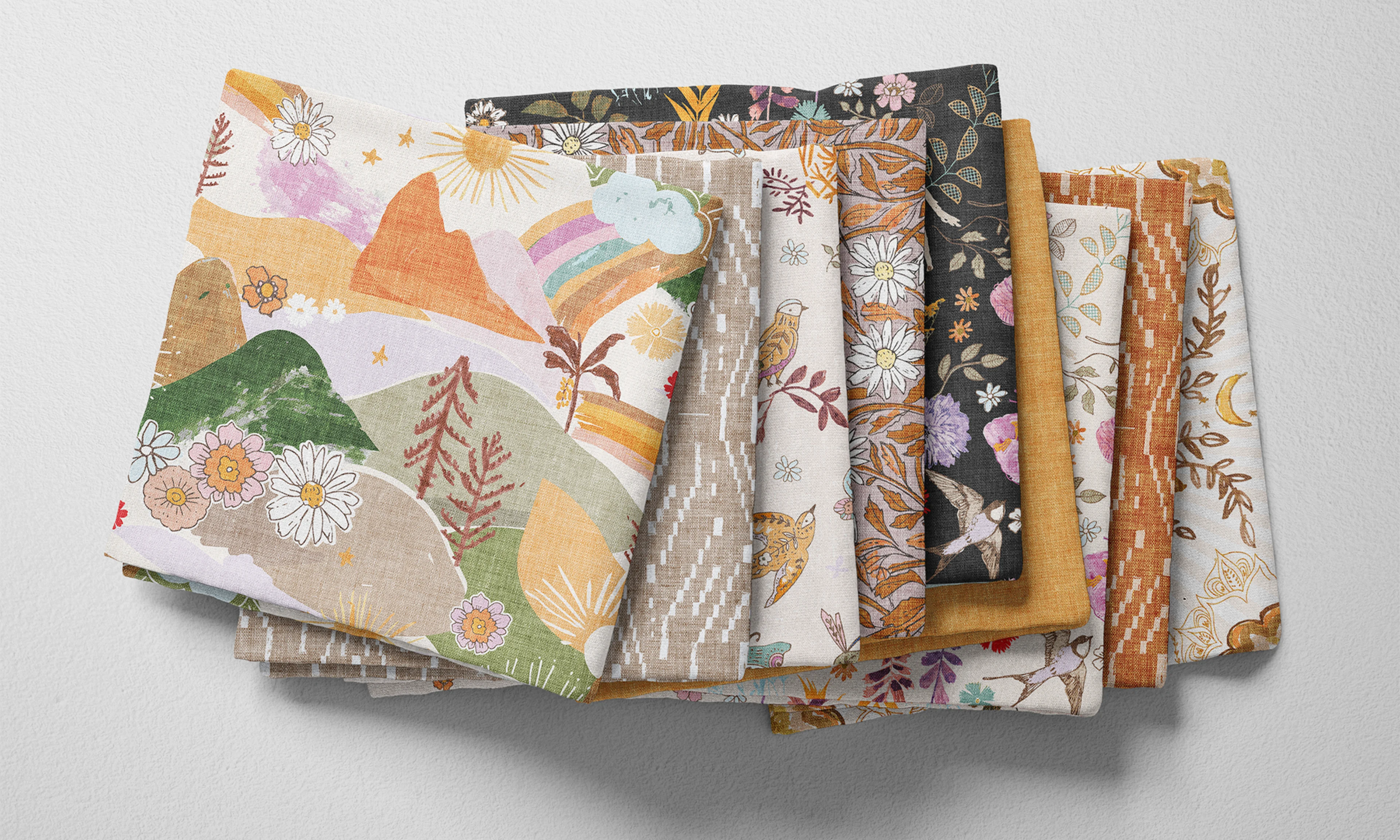 A selection of folded fabric by Spoonflower