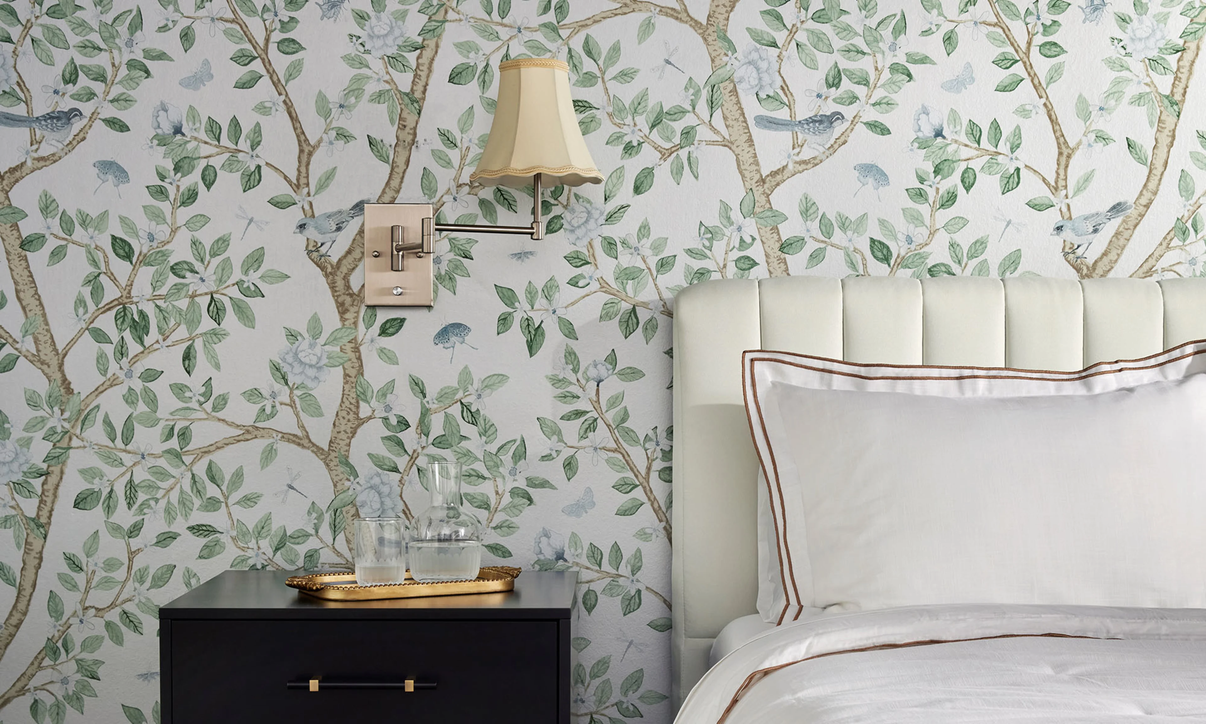 Bedroom with Metallic silver wallpaper with a branching tree design.