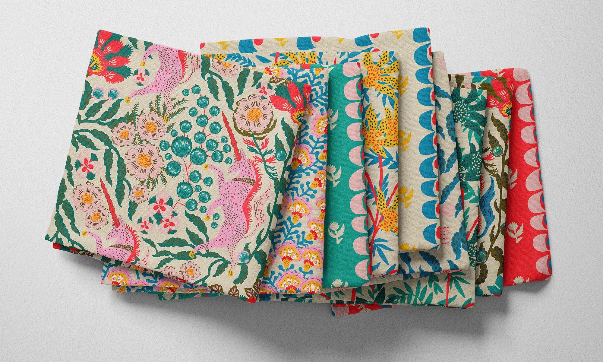 A selection of folded fabric by Spoonflower