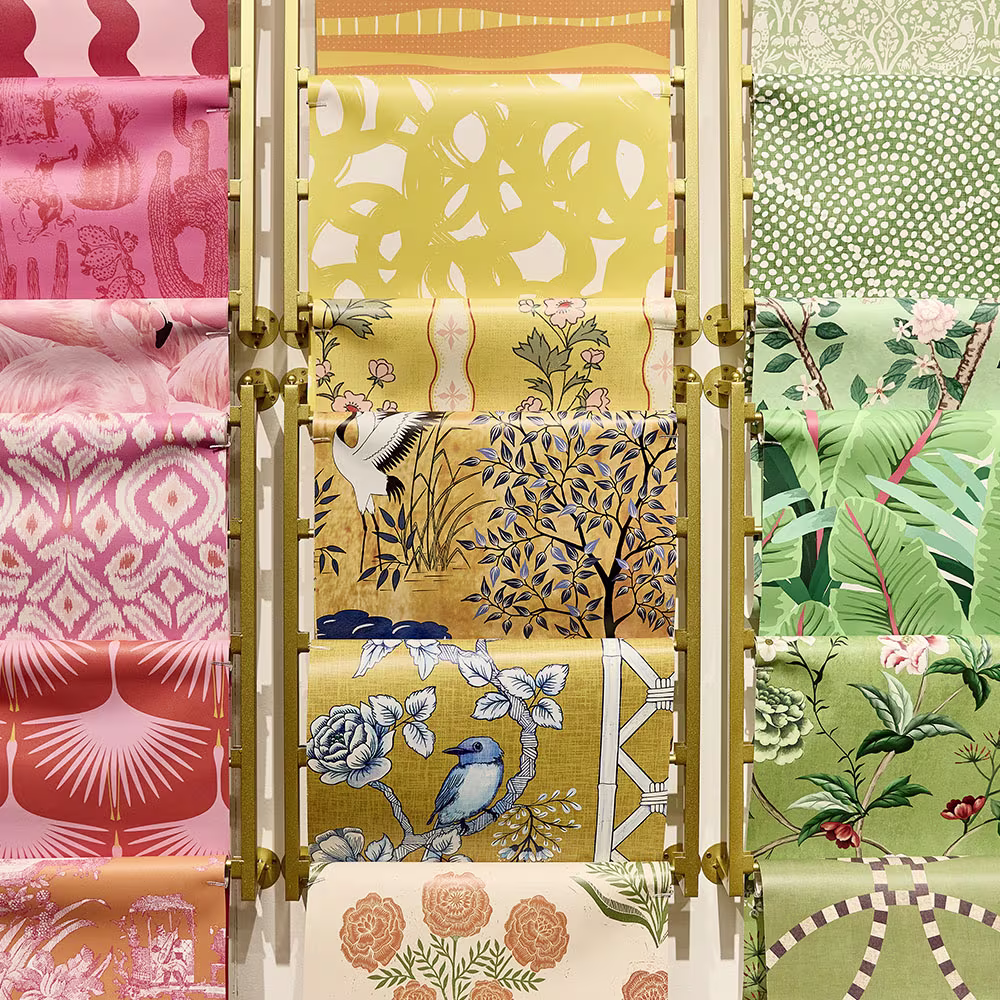 Detail view of printed wallpaper and fabric, showing color accuracy and material texture.