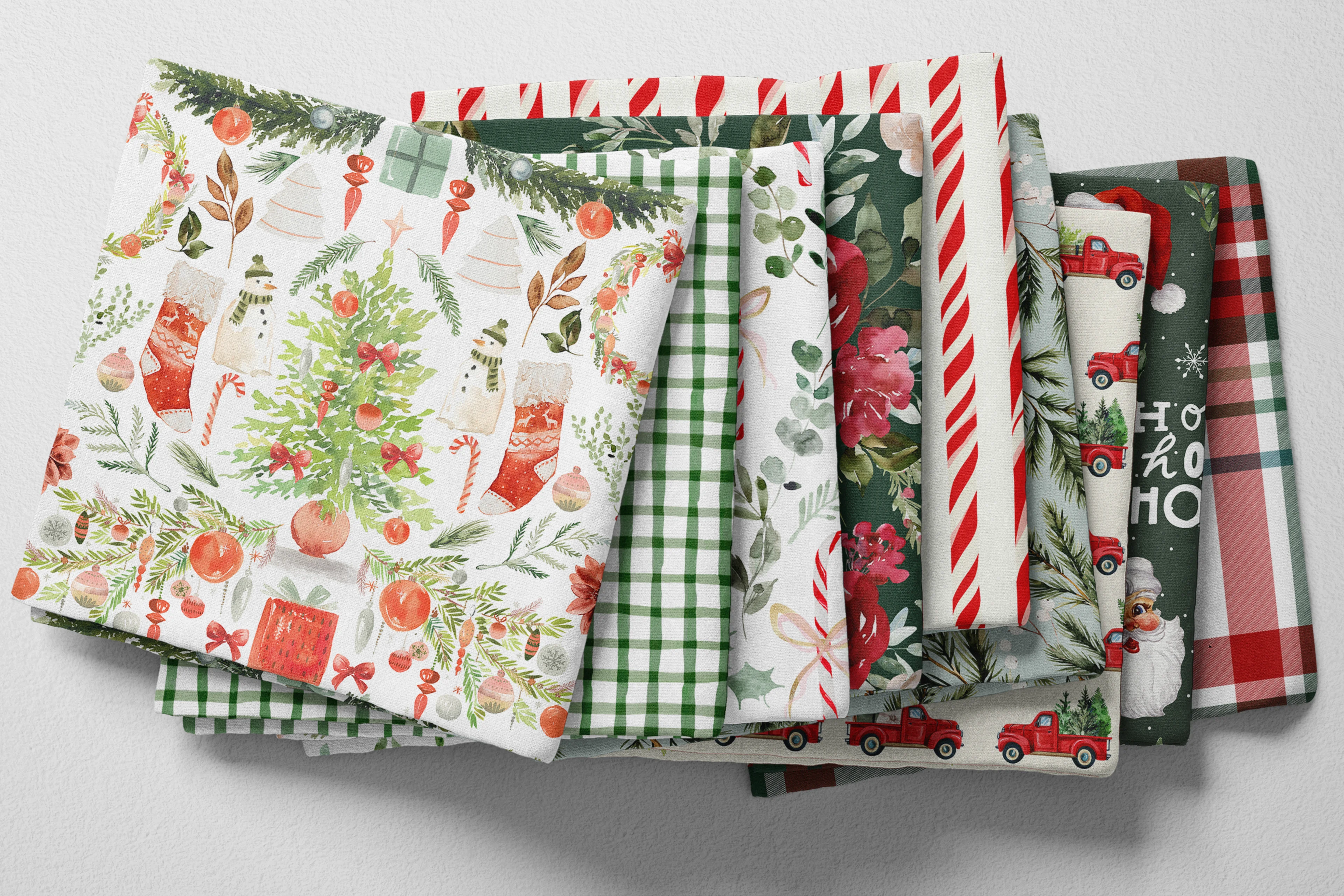 Colorful folded Spoonflower fabric with a Christmas theme