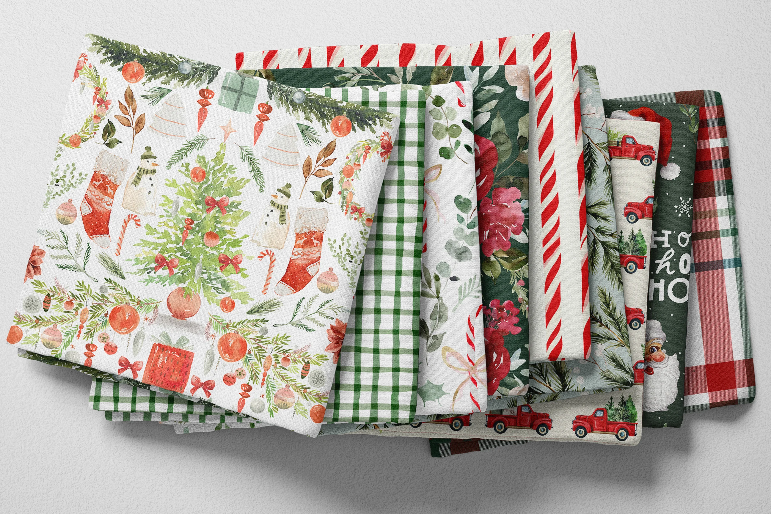 Colorful folded Spoonflower fabric with a Christmas theme