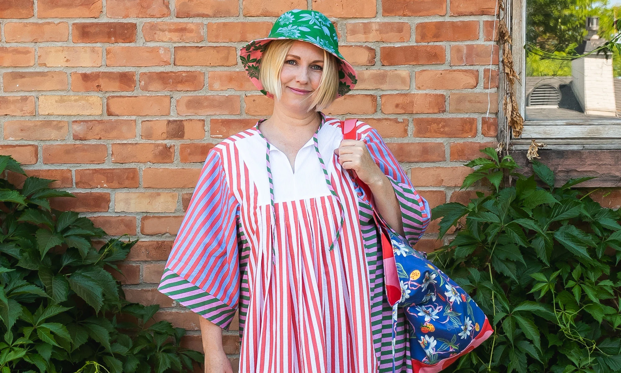 Brittany Watson Jepsen wearing her seersucker dress, tote and hat.
