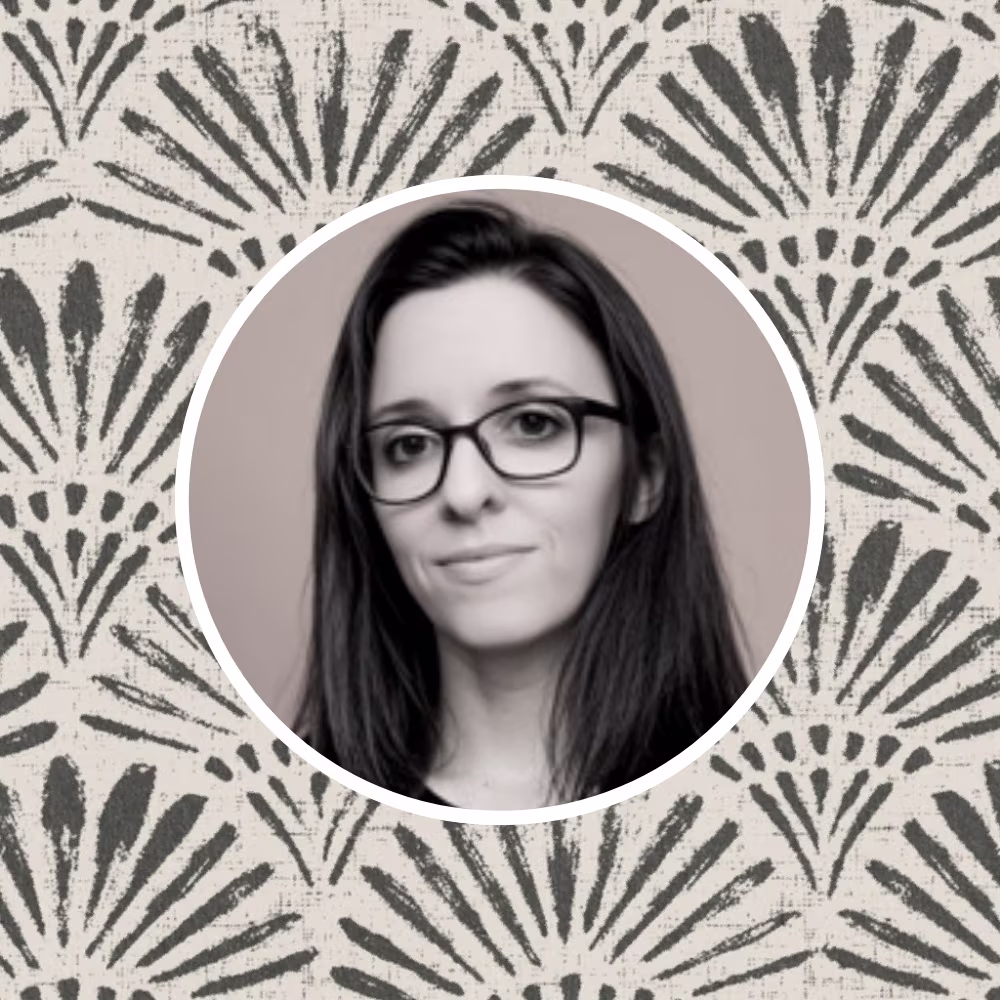 Headshot of Spoonflower artist Roberta in front of one of her designs.