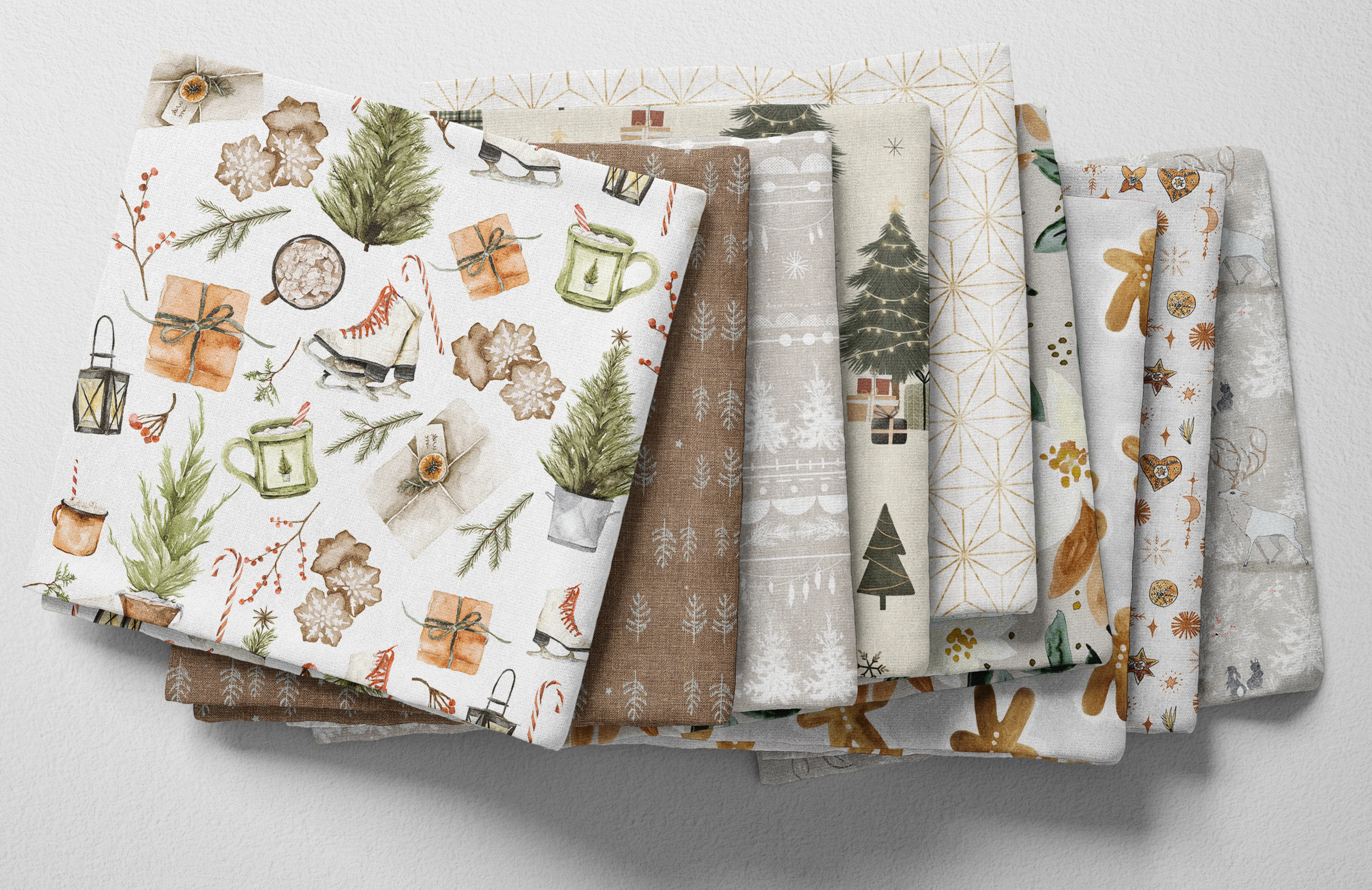 Neutral folded Spoonflower fabric with a boho Christmas theme