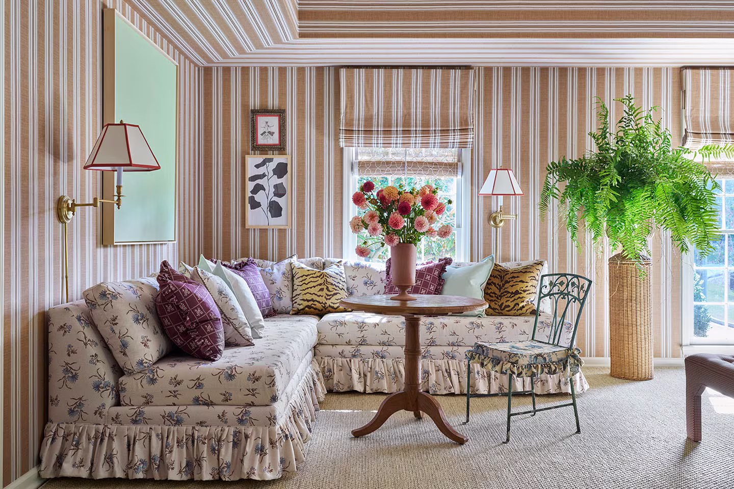 Living room pattern drenched with striped wallpaper on walls and ceiling.