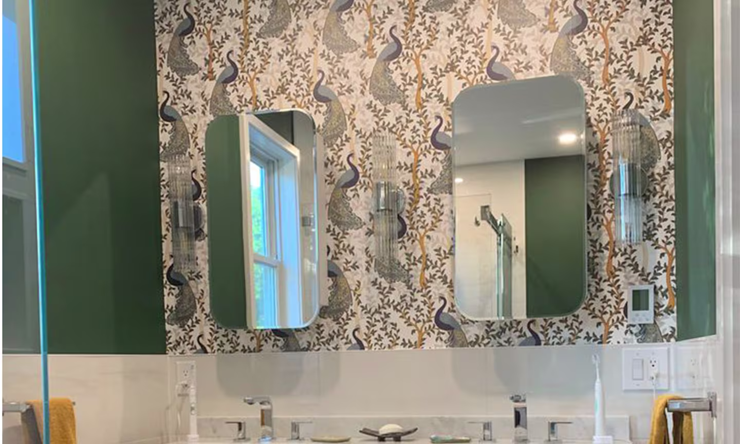 Bathroom with peacock fresco wallpaper.