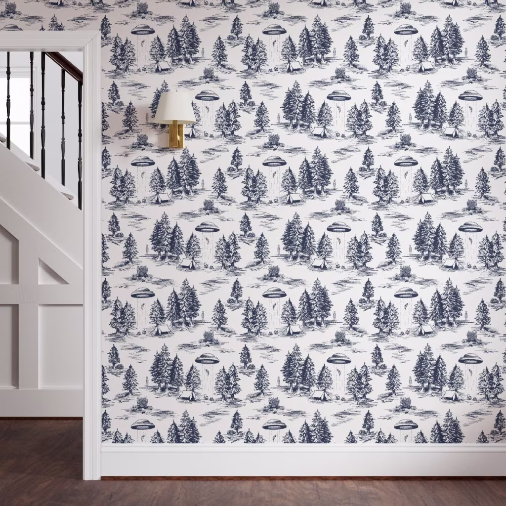Alien abduction toile printed wallpaper on a wall.