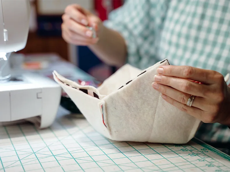 Getting ready to pin both layers of the bowl cozy together with right sides facing. The batting is facing outward.