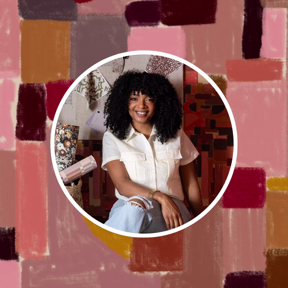 Headshot of Marie of Indigo Pruitt in front of one of her designs.