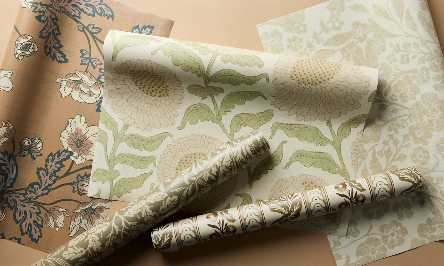 Earthy beige colored wallpaper rolls.