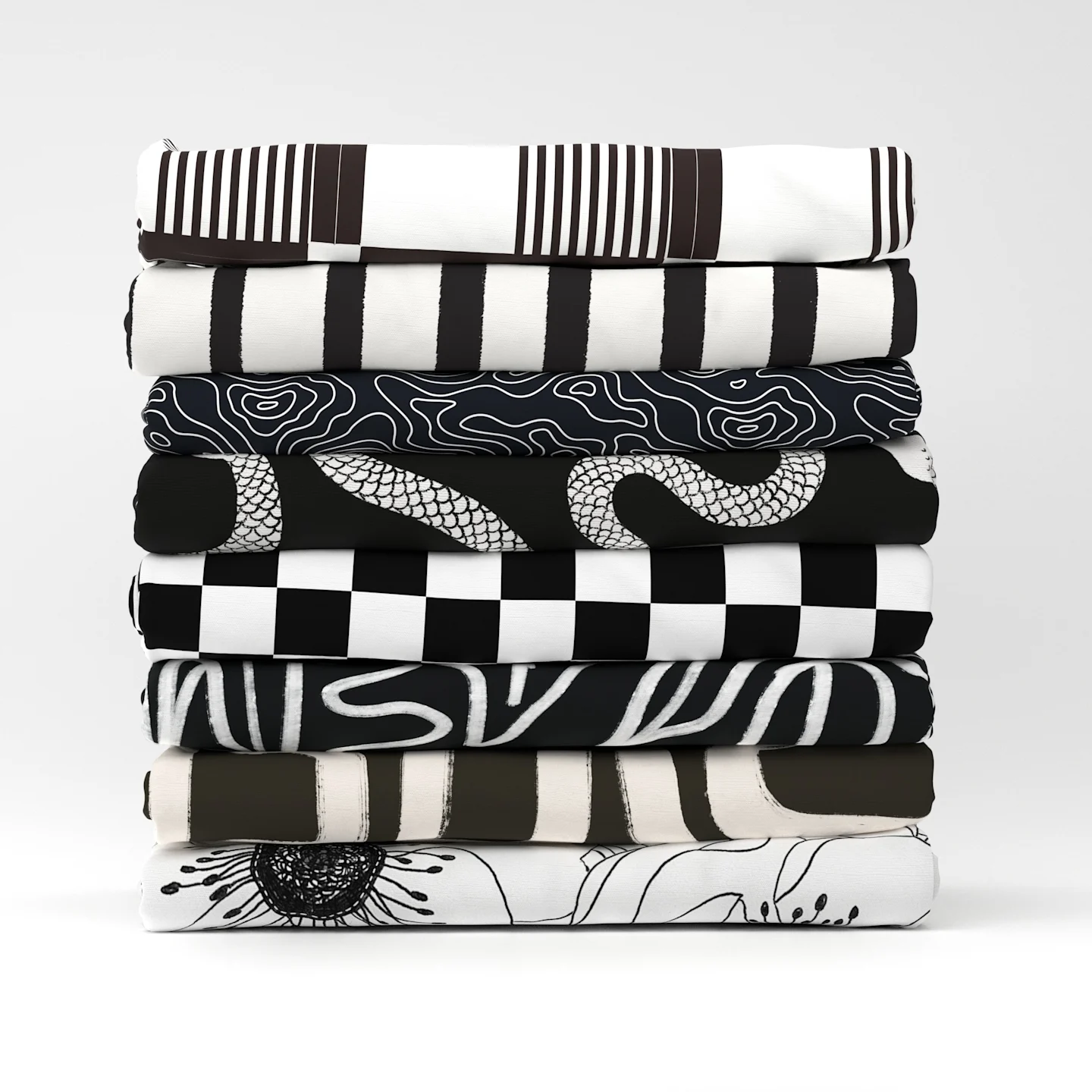 Stack of black and white fabrics