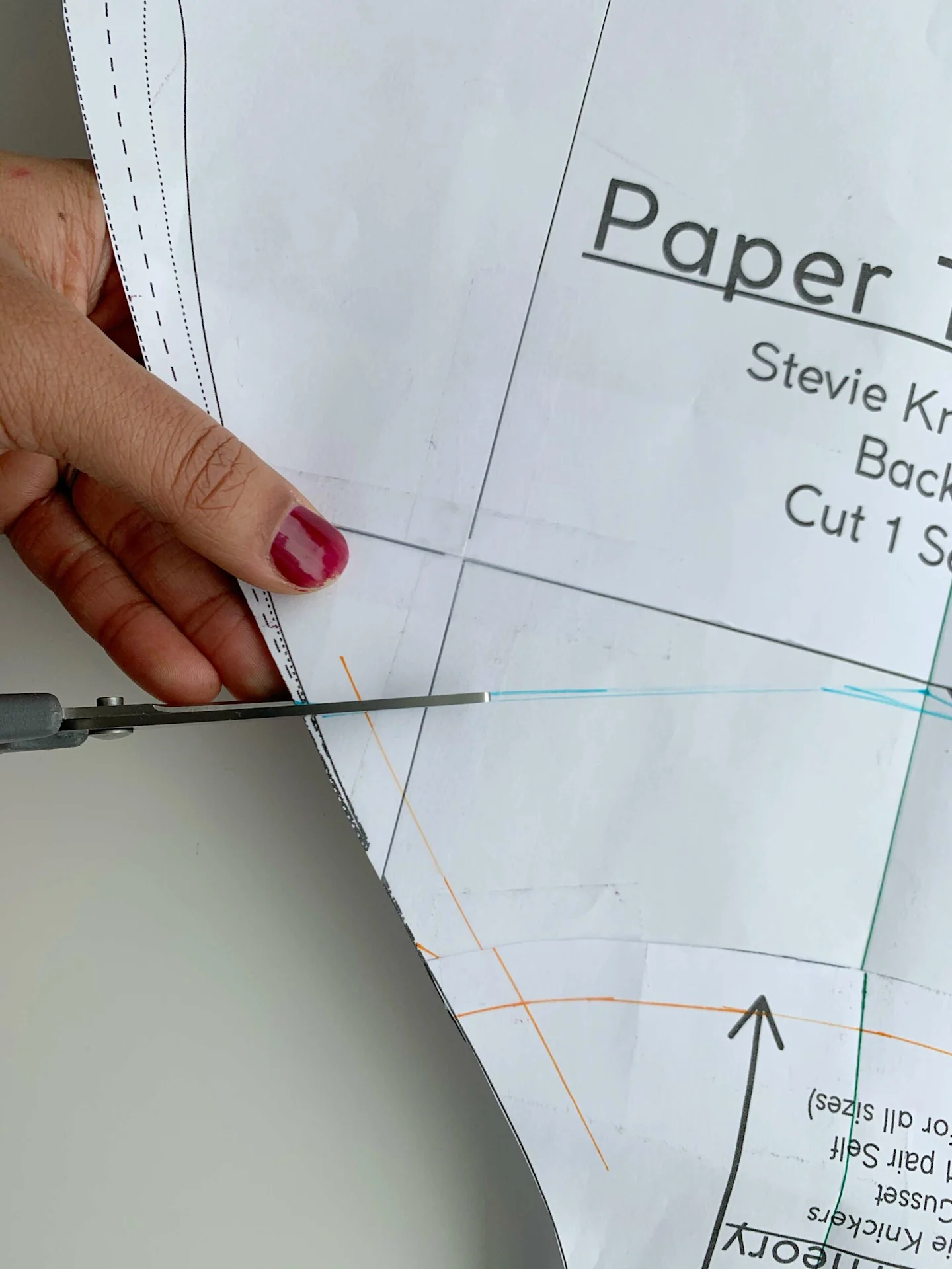 Scissors cutting the gusset pattern