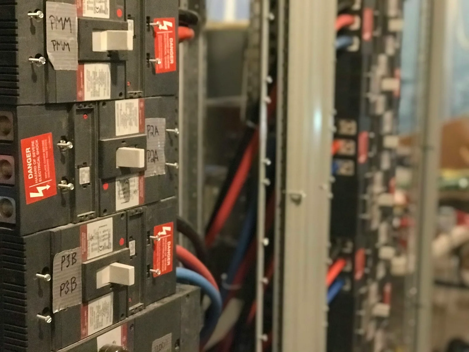 Switchgear in an industrial distribution board. The redundancy decision is made here and priced at the exit.