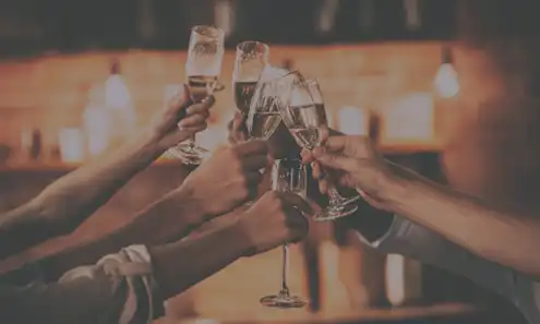 a man holding a glass of wine