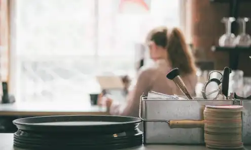 a woman sitting on a counter