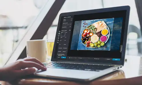 A picture of a laptop computer sitting on top of a table.