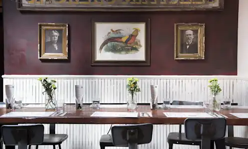 a desk with a chair in a room