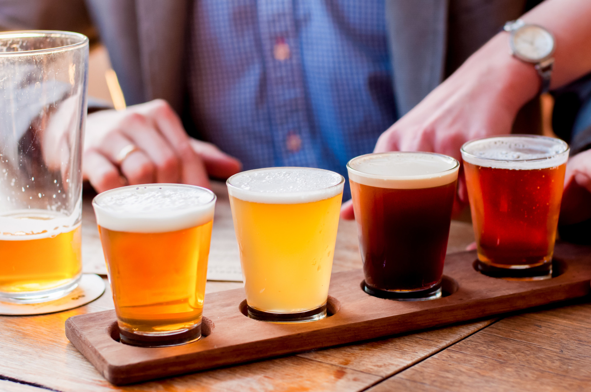 Flight of beers on a wooden board