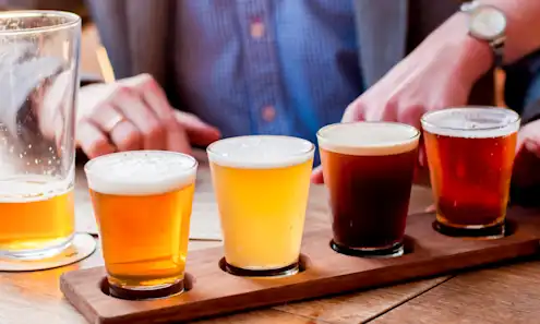 Flight of beers on a wooden board