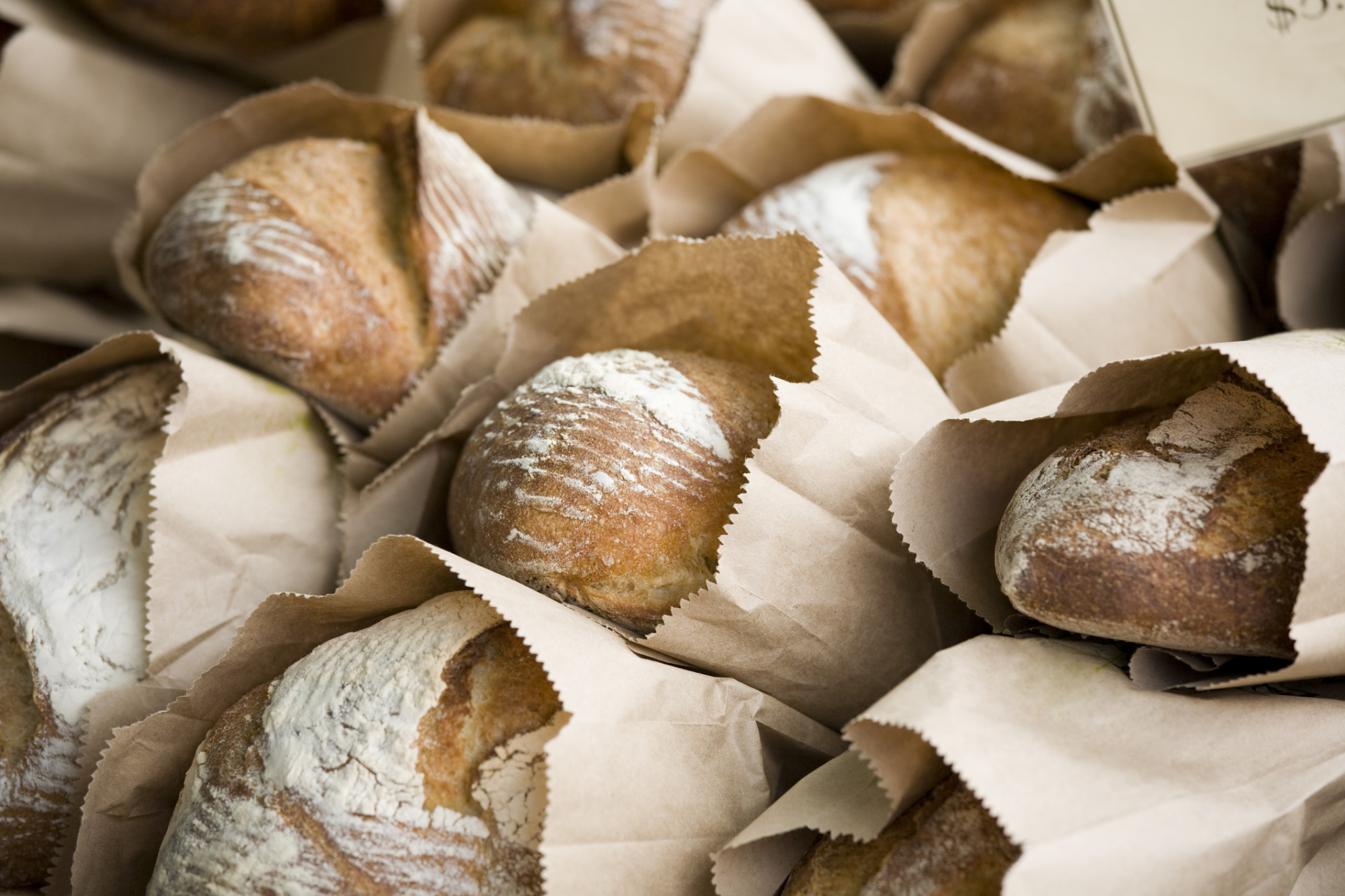 a close up of many different types of bread