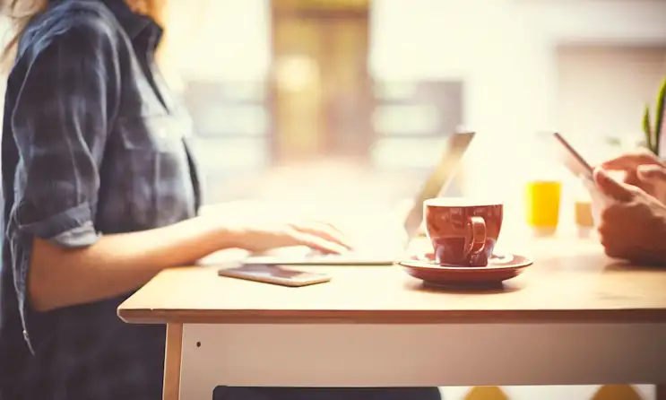 a person standing in front of a table
