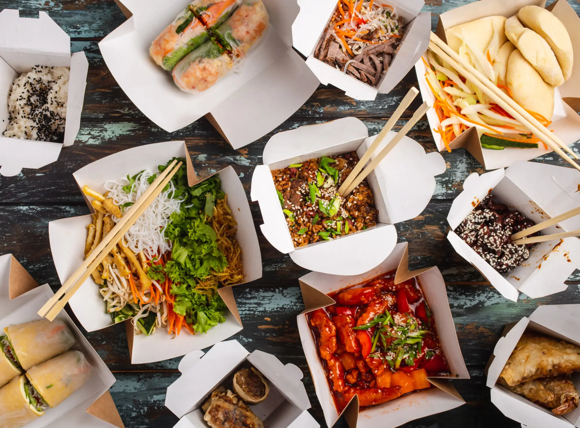 a bunch of different types of food on a table
