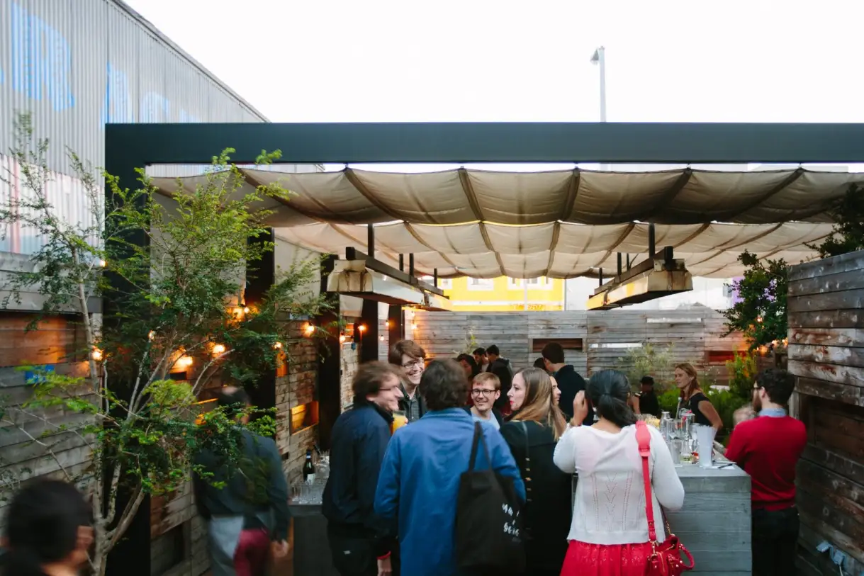 The lively outdoor bar scene at Bar Agricole.
