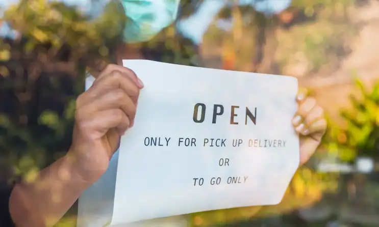 a person holding a sign