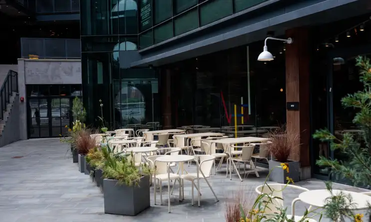 a chair sitting in front of a building