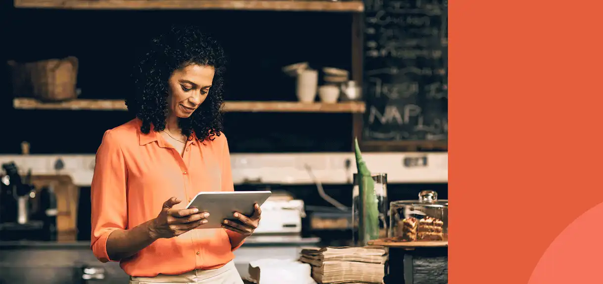 A woman holding a tablet computer