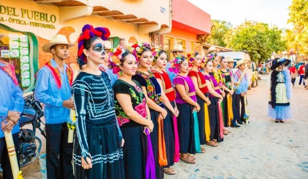 Group of people dressed up for Day of the Dead