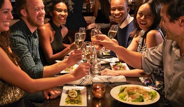 Group of friends sharing a delicious meal
