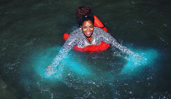 Woman swimming in the Luminous Lagoon