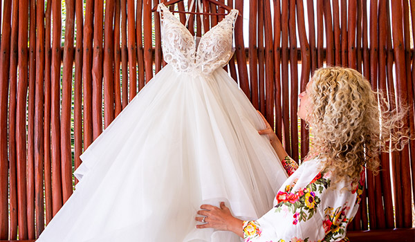 Bride looking at her wedding dress