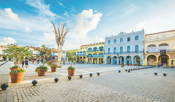 Blue and yellow historic buildings in Havana