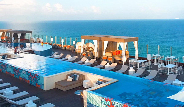 Rooftop pool in Cancun overlooking the ocean
