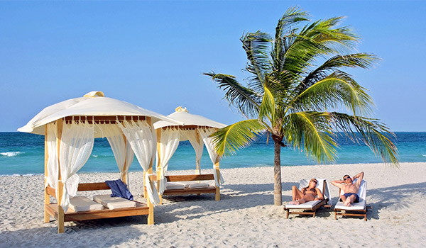 Swim-out suite with loungers and Bali beds