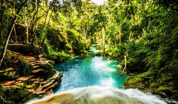 Tranquil pool and waterfall at Blue Hole