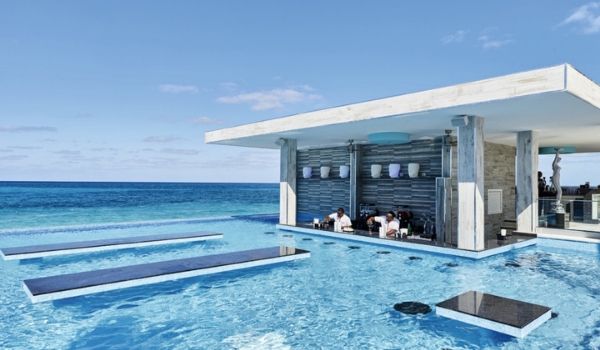Sparkling infinity pool with a swim-up bar