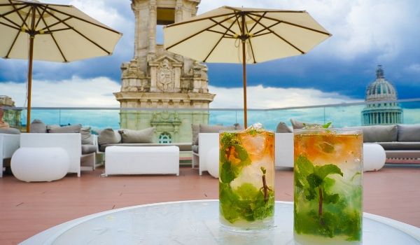Two cocktails on a patio