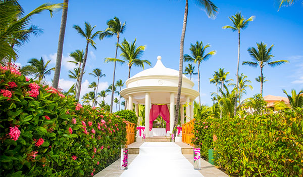 Wedding gazebo surrounded by lush gardens