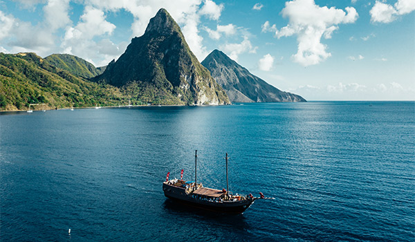 Sailboat cruising along the coast